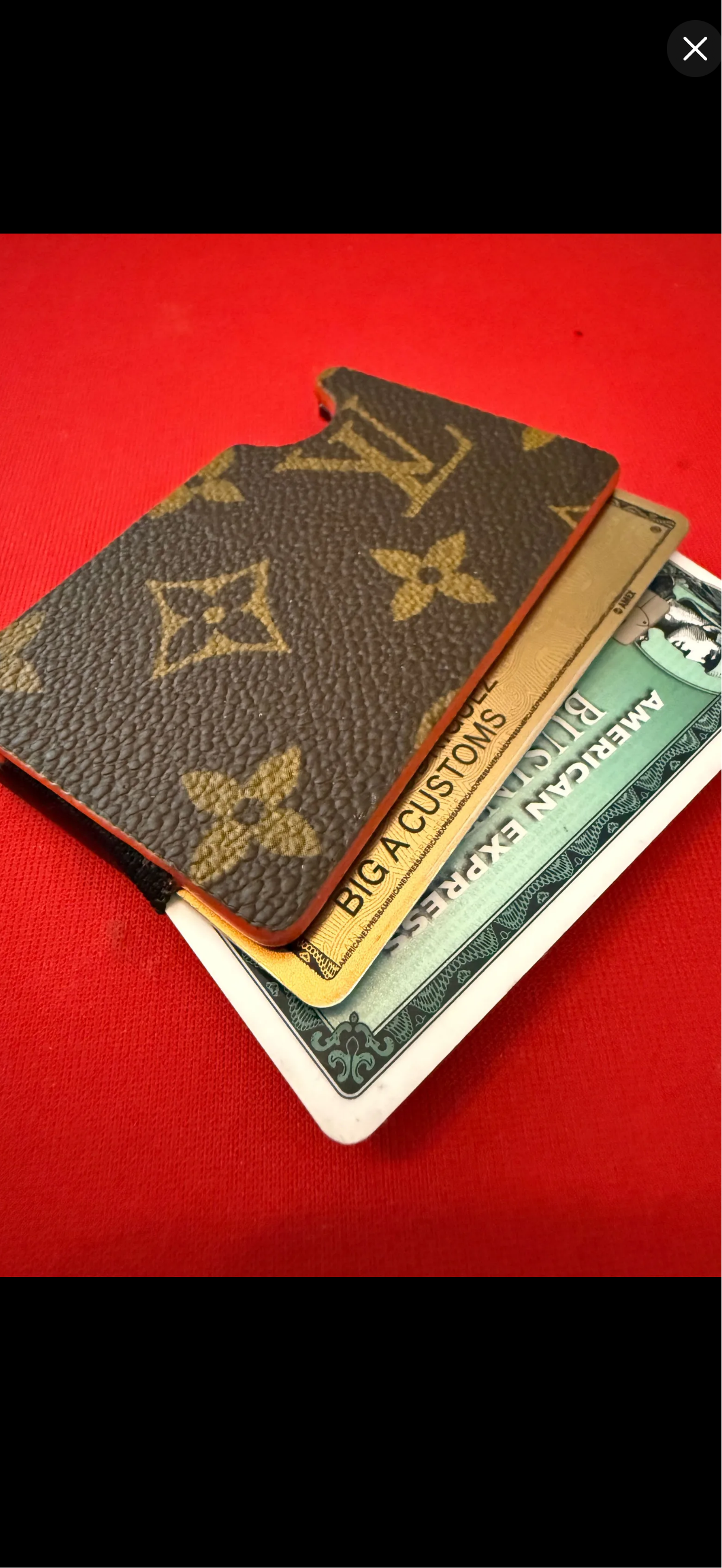 Custom “VIRGIL” card holder with orange edges.
