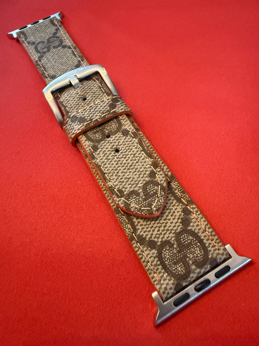 Custom Apple Watch strap with orange 🍊 stitching and edge.